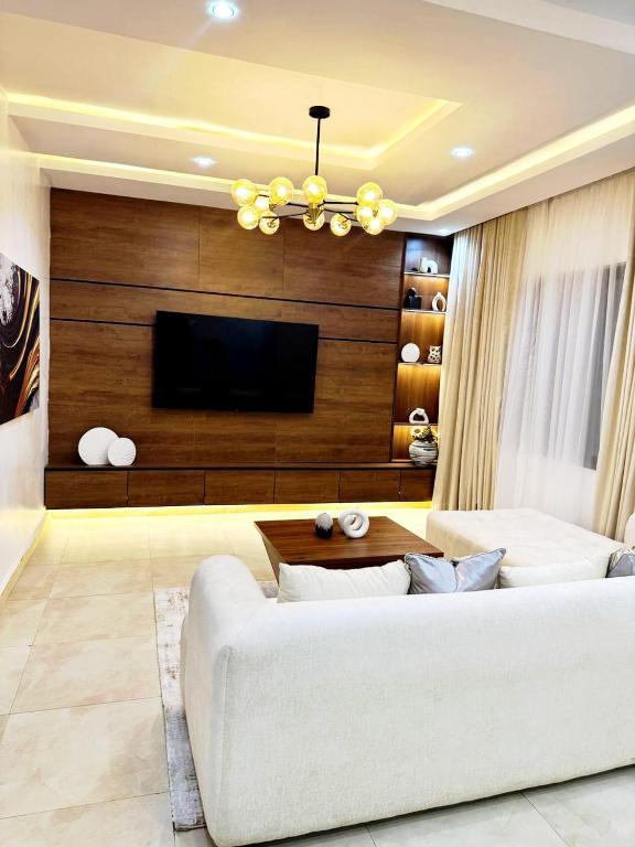 TV a/nebo společenská místnost v ubytování GoldenHills home