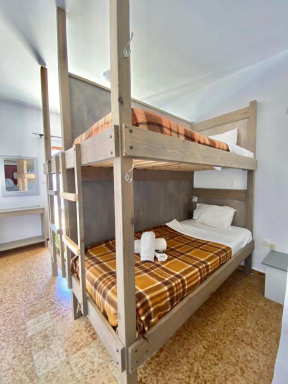 Postel nebo postele na pokoji v ubytování Afroditi Hotel