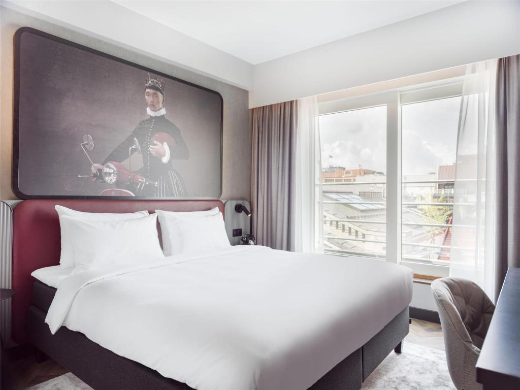 Postel nebo postele na pokoji v ubytování Radisson RED Oslo City Centre