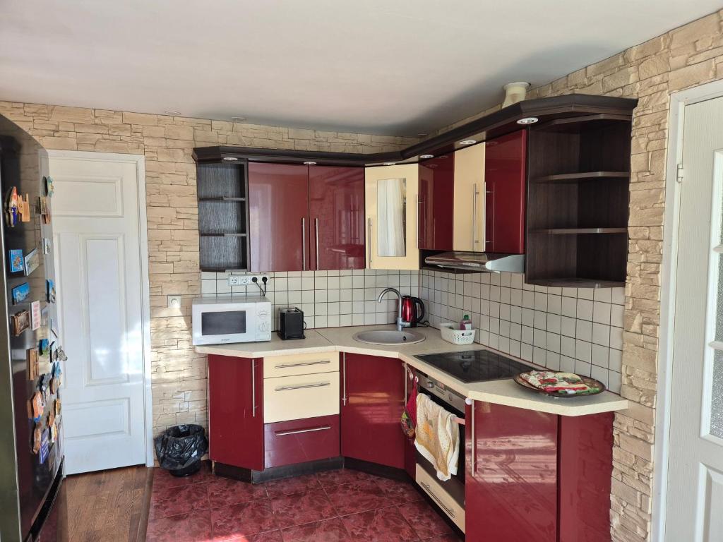 Kuchyň nebo kuchyňský kout v ubytování Mäe Apartment