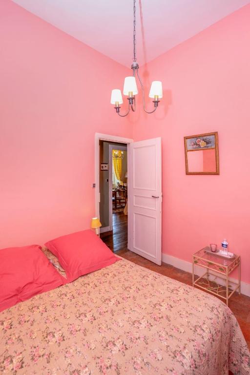 Postel nebo postele na pokoji v ubytování Domaine du Pegulier