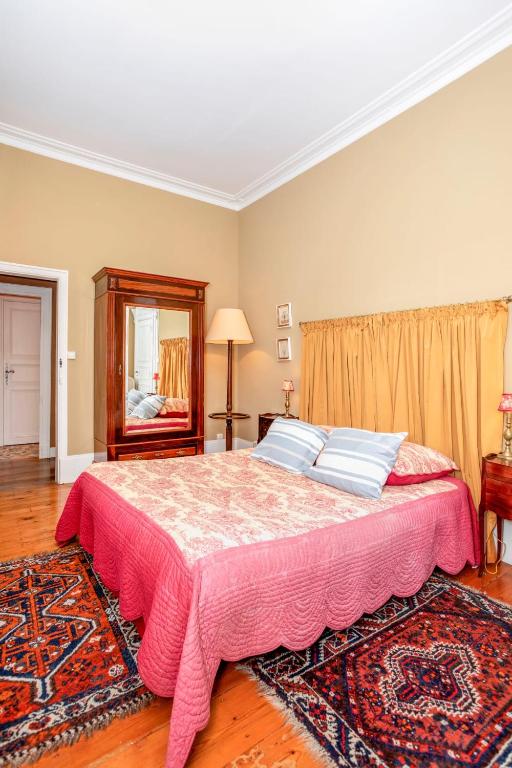 Postel nebo postele na pokoji v ubytování Domaine du Pegulier