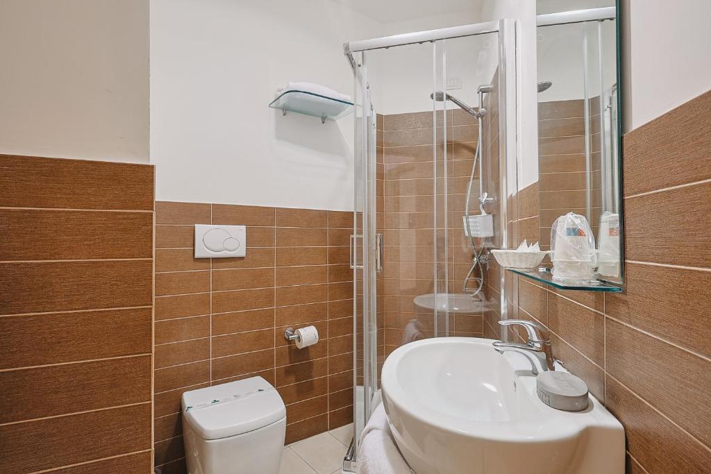 Koupelna v ubytování Bi Hotel