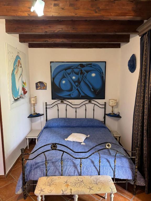 Postel nebo postele na pokoji v ubytování Le Macine 1868