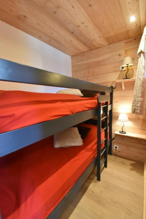Postel nebo postele na pokoji v ubytování CHALET SERRE CHEVALIER AVEC VUE EXCEPTIONNELLE