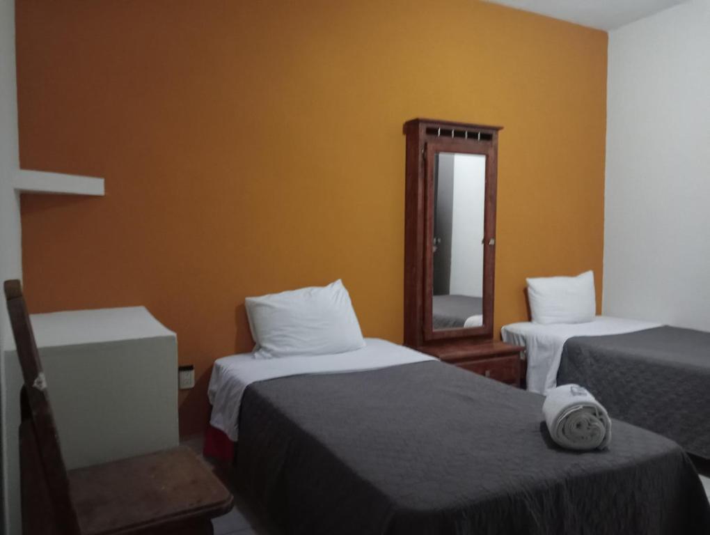 Postel nebo postele na pokoji v ubytování Residencia San Pablo