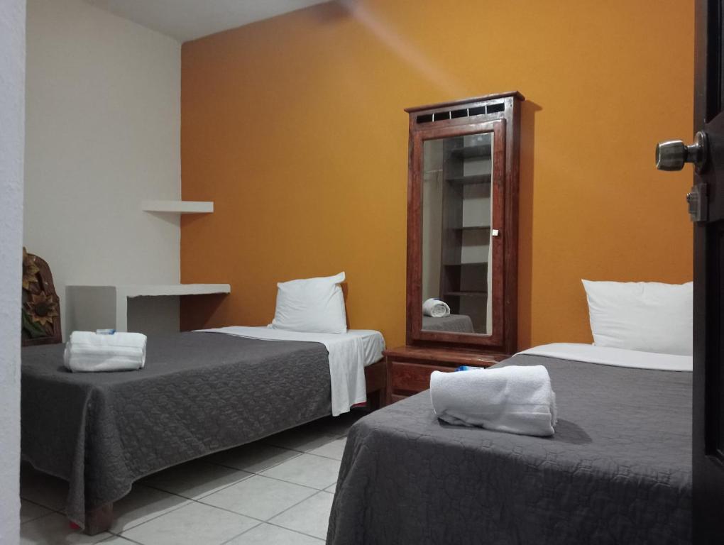 Postel nebo postele na pokoji v ubytování Residencia San Pablo