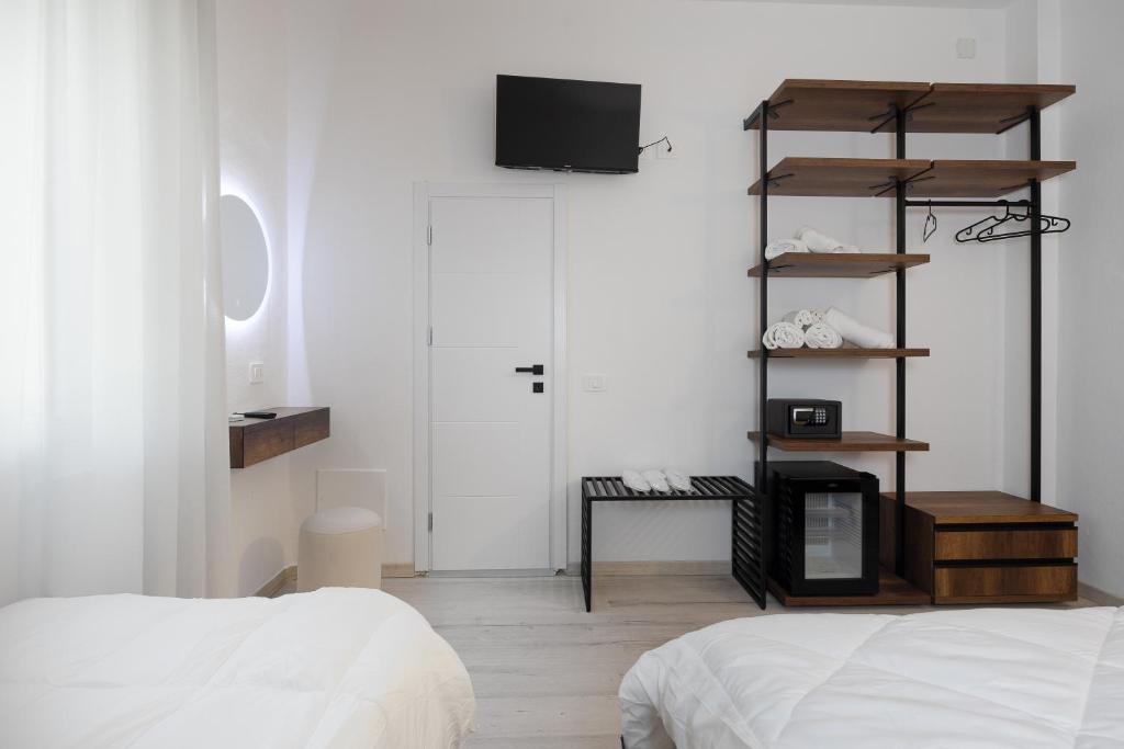 Postel nebo postele na pokoji v ubytování Hotel Levante Cesenatico