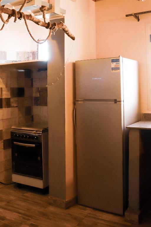 Kuchyň nebo kuchyňský kout v ubytování Tecoma guesthouse