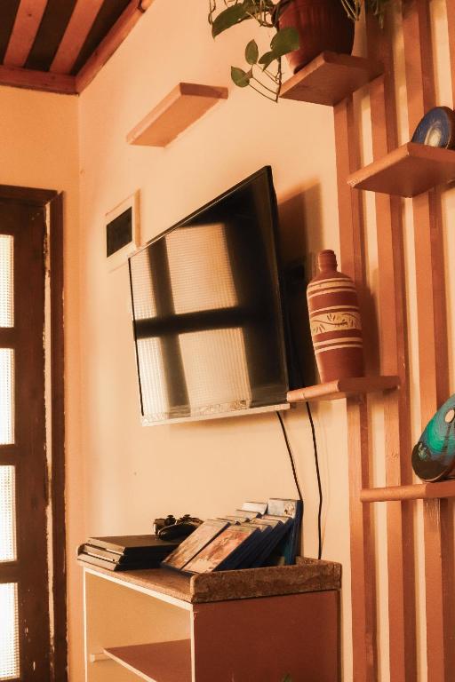 TV a/nebo společenská místnost v ubytování Tecoma guesthouse