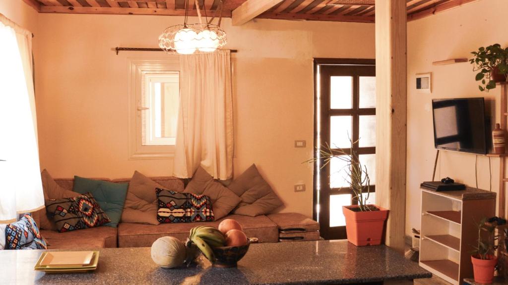 TV a/nebo společenská místnost v ubytování Tecoma guesthouse