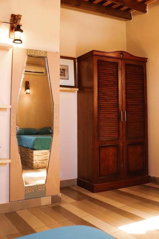 Postel nebo postele na pokoji v ubytování Tecoma guesthouse