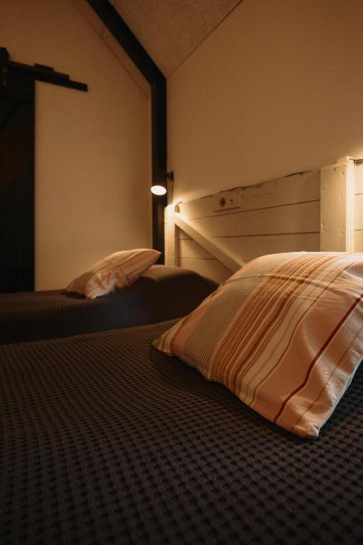 Postel nebo postele na pokoji v ubytování Ferieidyl