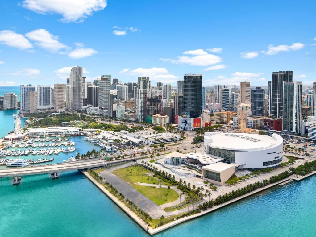 an aerial view of a city with a marina at Penthouse Infinity heated pool and jacuzzi in Miami