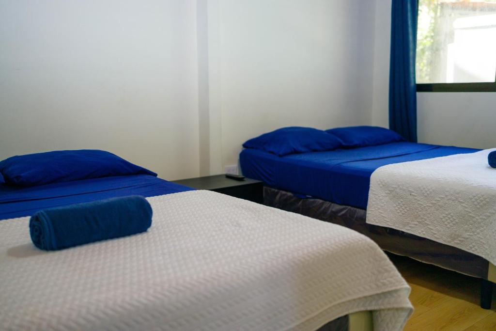 Postel nebo postele na pokoji v ubytování Bambutel Cocles