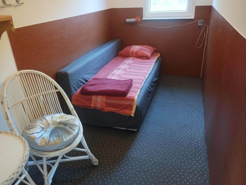 Postel nebo postele na pokoji v ubytování Chatka pod Javorovým