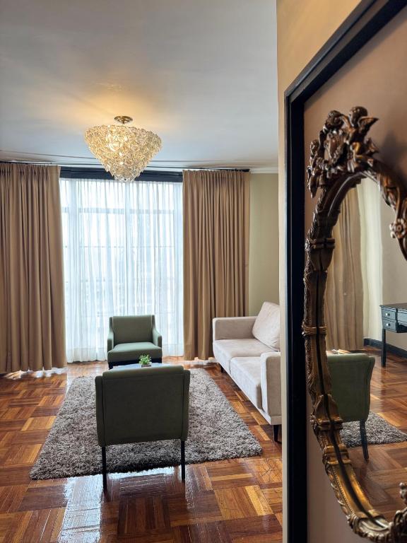 Posezení v ubytování Hotel Nutibara