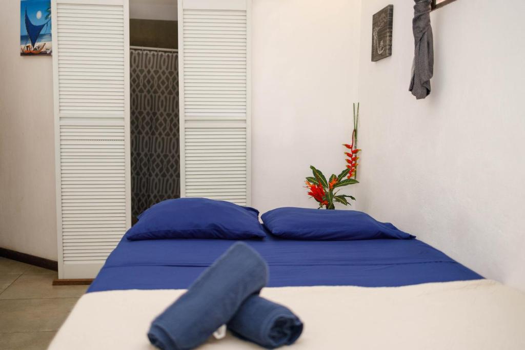 Postel nebo postele na pokoji v ubytování Bambutel Cocles