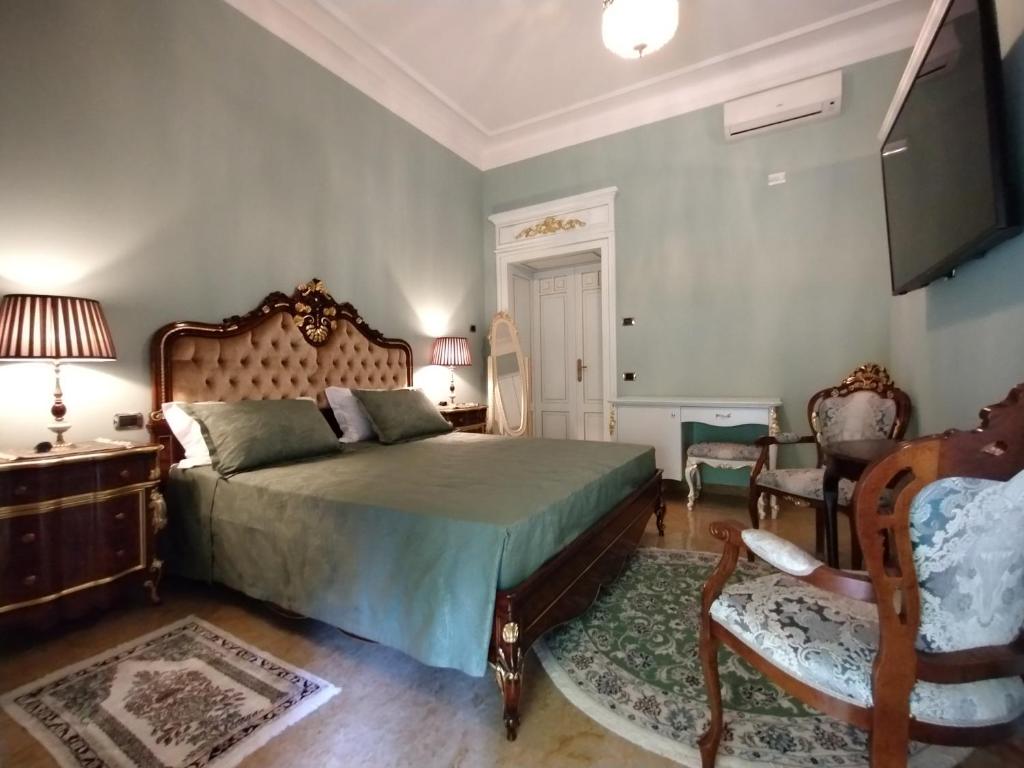 Postel nebo postele na pokoji v ubytování NOBILI LIBARDI - VILLA BASEVI