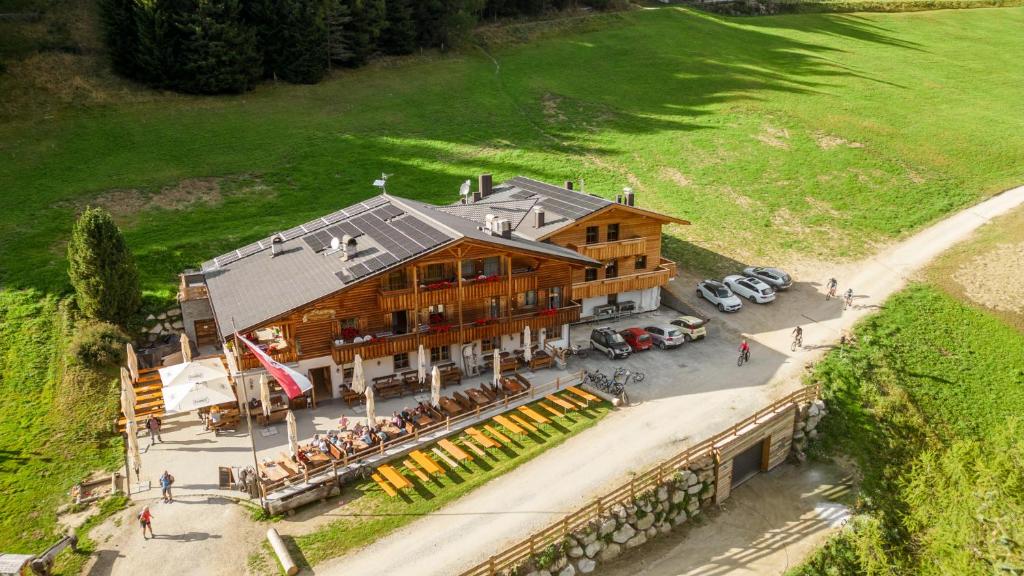 an overhead view of a large building with a restaurant at Grossberghütte - Altfasstal in Mühlbach