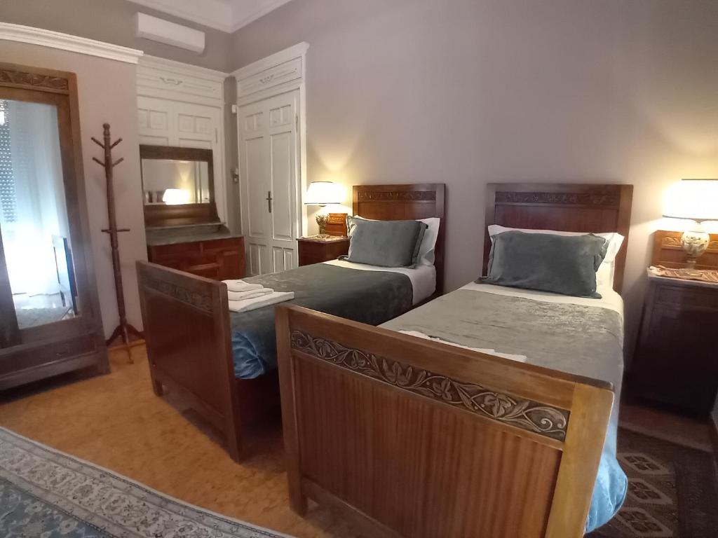 Postel nebo postele na pokoji v ubytování NOBILI LIBARDI - VILLA BASEVI