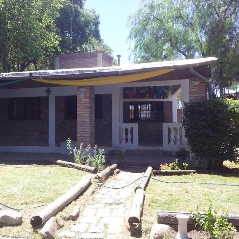 a house with a garden in front of it at La casita in Mendoza