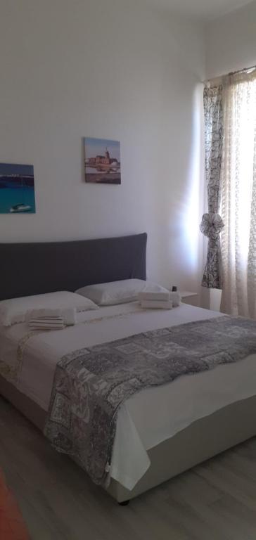 Postel nebo postele na pokoji v ubytování Casa dei Mulini a vento