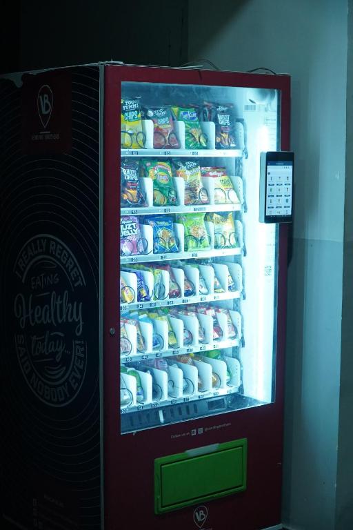 a refrigerator filled with lots of food at The Nest Studio by Raaya Nook in Jaipur
