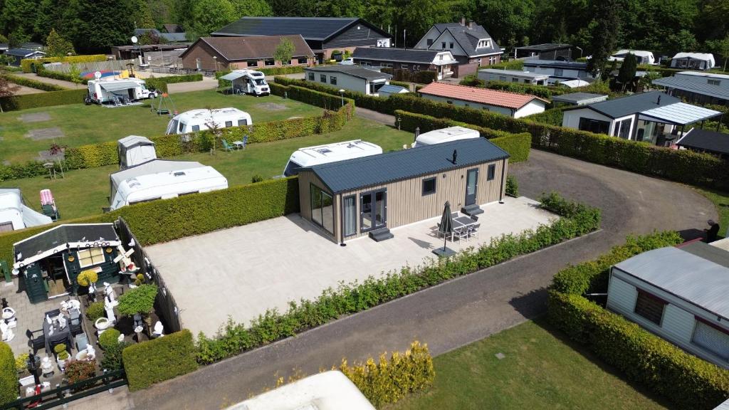 an aerial view of a small village with a building at Chalet "de Bosrand" in Stroe