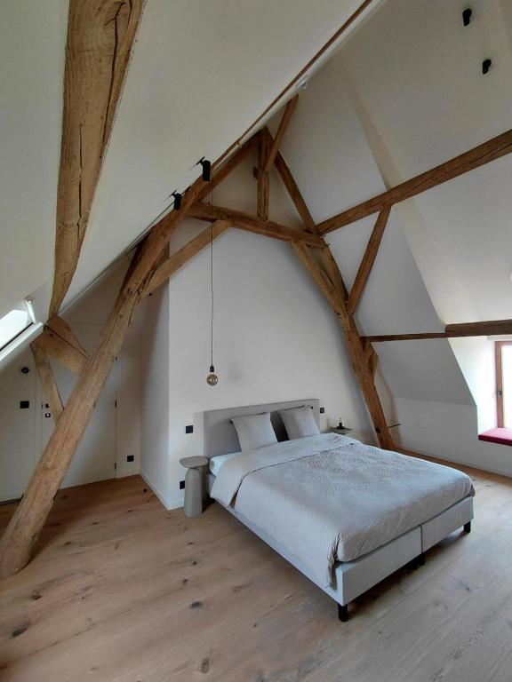 Postel nebo postele na pokoji v ubytování Hoeve De Hemel