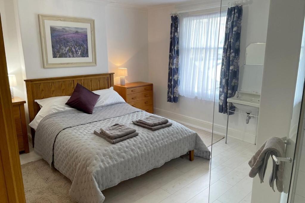 Postel nebo postele na pokoji v ubytování Heathcote Llandudno