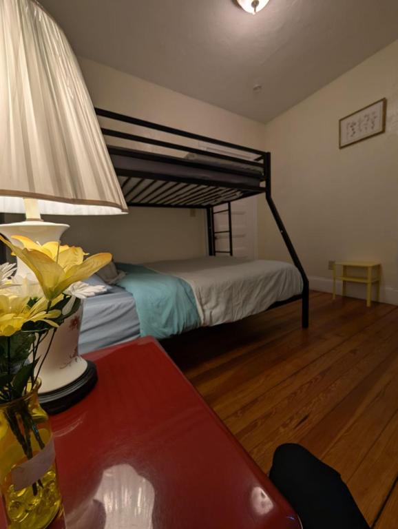 Postel nebo postele na pokoji v ubytování Boston Homestel