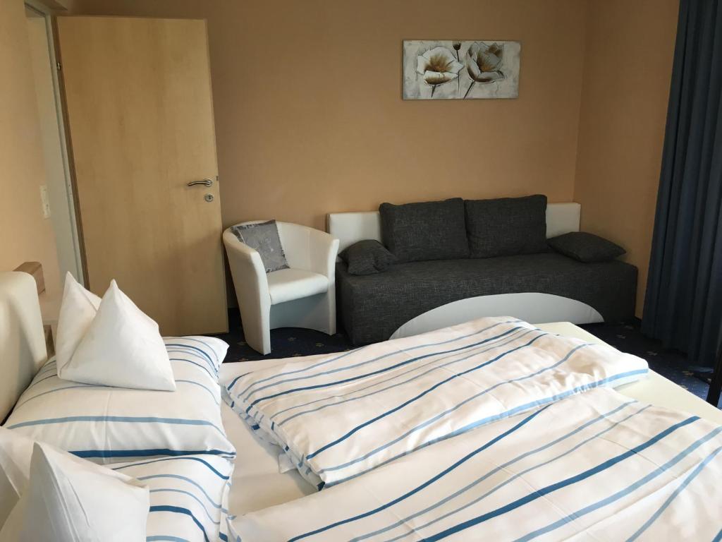 Postel nebo postele na pokoji v ubytování Gästehaus Kloibergütl