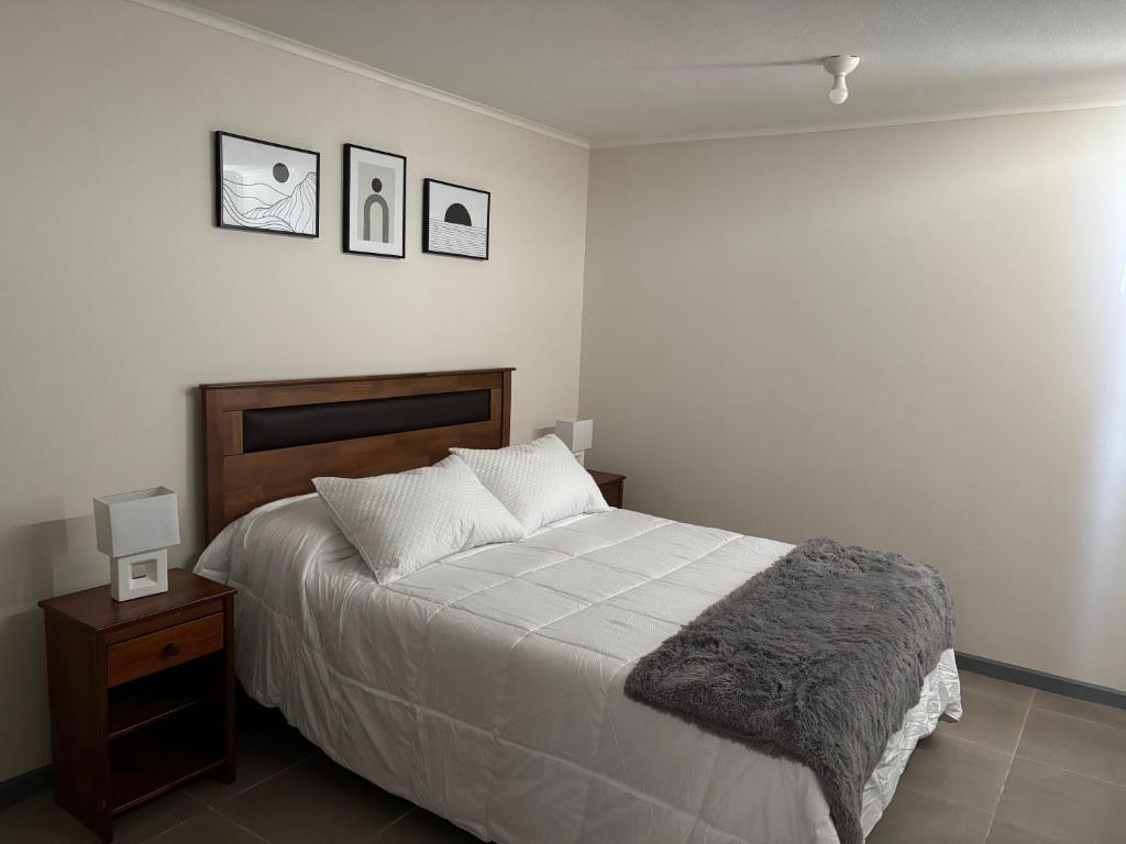 Ένα ή περισσότερα κρεβάτια σε δωμάτιο στο Dormitorio matrimonial con baño privado - altos de san miguel