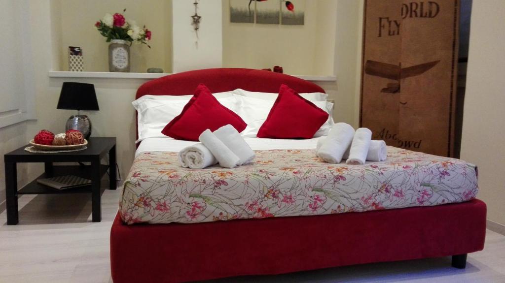 Łóżko lub łóżka w pokoju w obiekcie Borgo20 Firenze