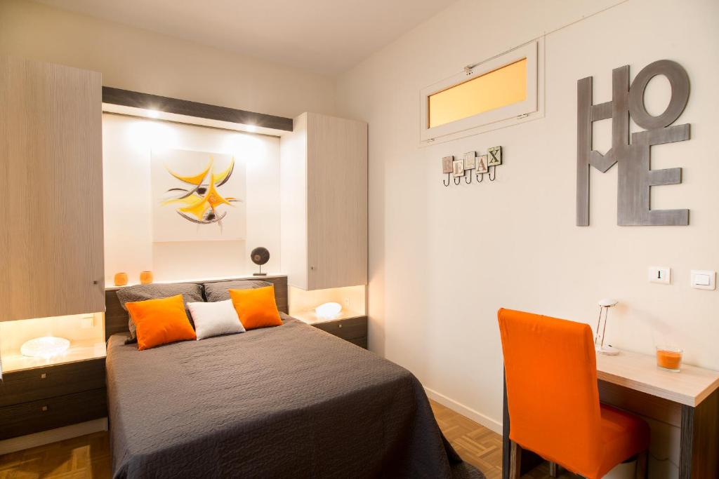 Postel nebo postele na pokoji v ubytování B&B Le Logis Du Mas