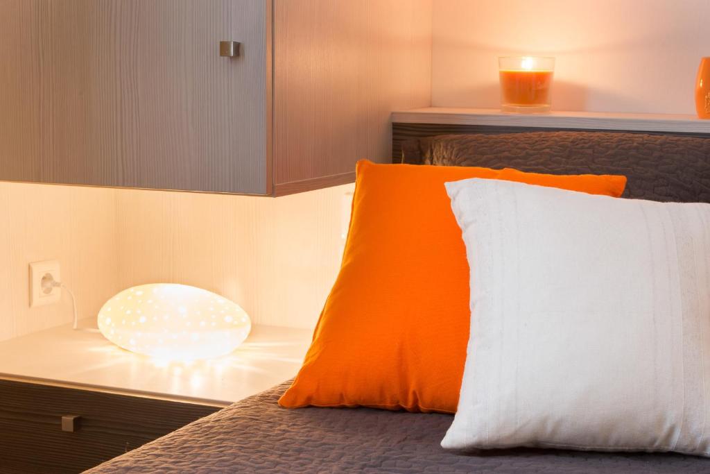 Postel nebo postele na pokoji v ubytování B&B Le Logis Du Mas