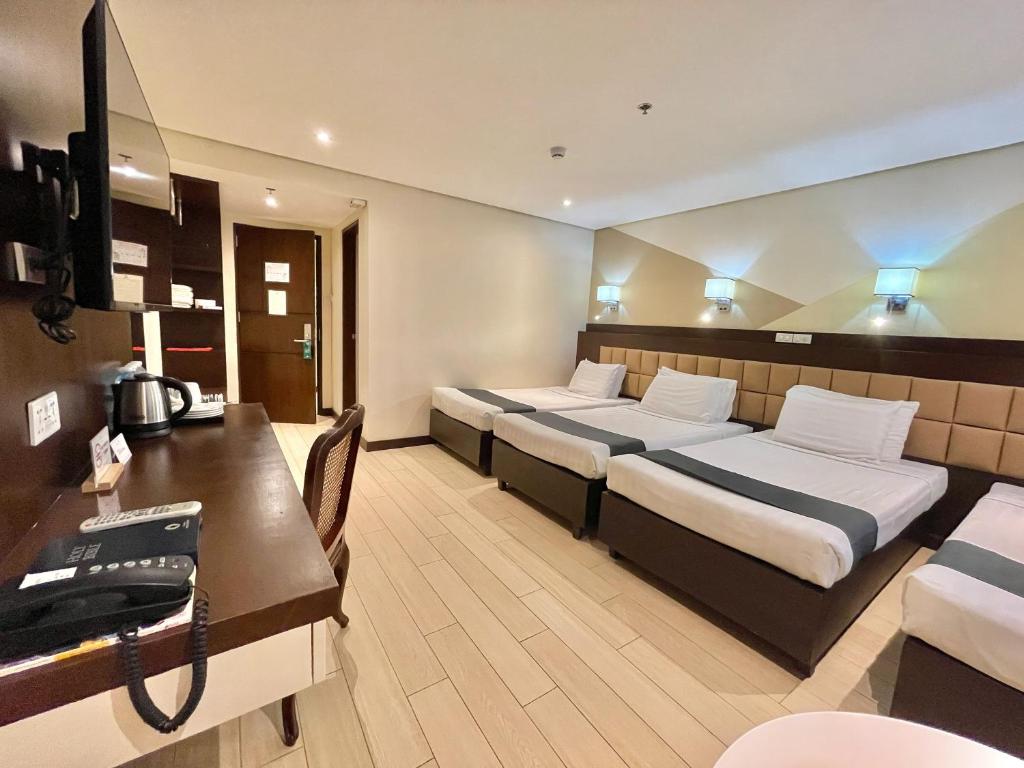 TV a/nebo společenská místnost v ubytování The VIP Hotel