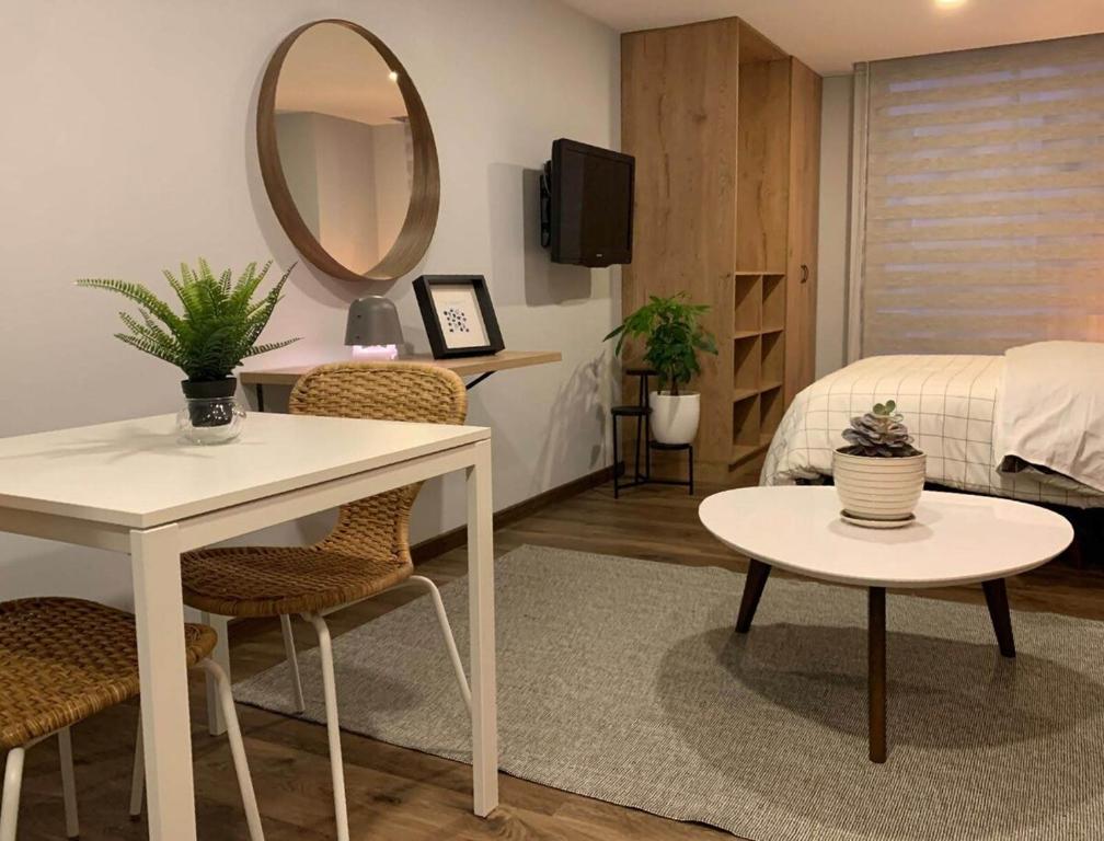 Katil atau katil-katil dalam bilik di Cómodo loft con lavadora wifi y parking