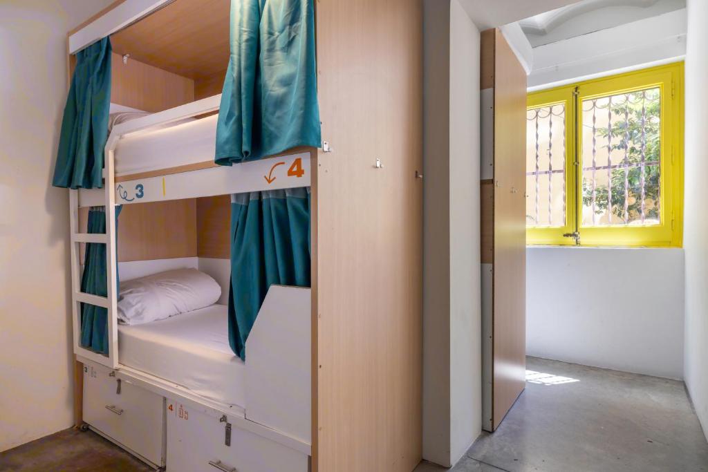 Cama ou camas em um quarto em The Loft House Barcelona
