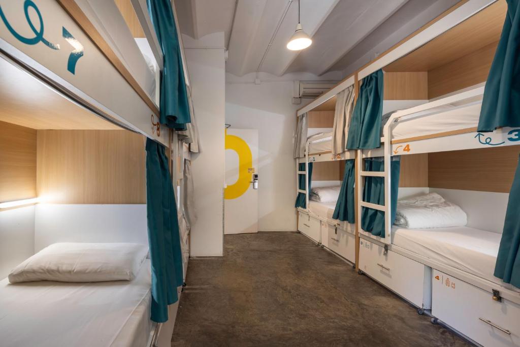 Cama ou camas em um quarto em The Loft House Barcelona
