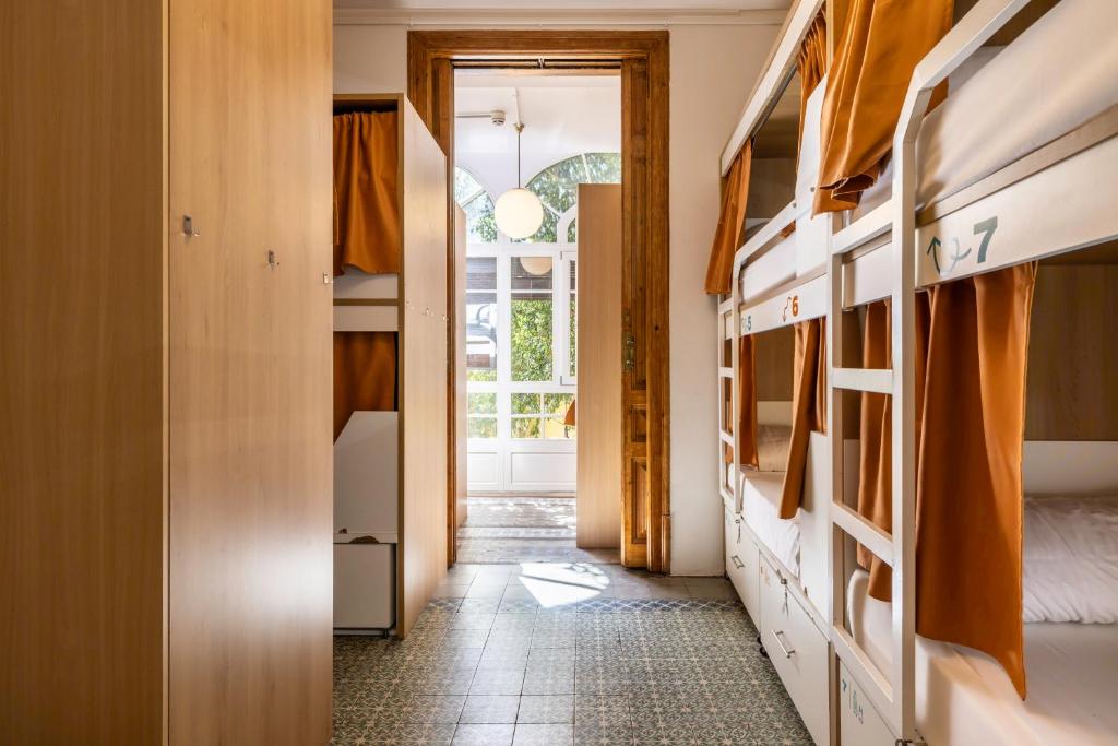 Cama ou camas em um quarto em The Loft House Barcelona