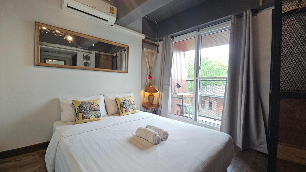 Postel nebo postele na pokoji v ubytování 33 Poshtel