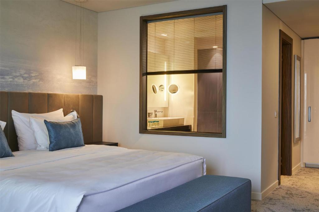 Postel nebo postele na pokoji v ubytování Hotel Kempinski Palace Portorož
