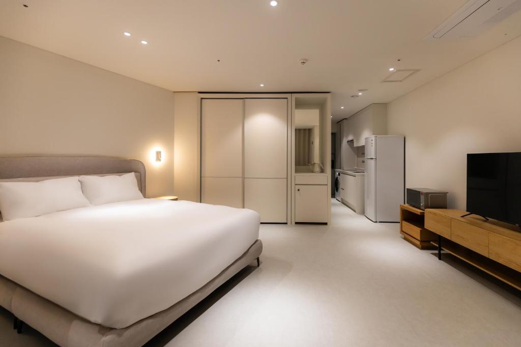 Postel nebo postele na pokoji v ubytování Hotel Modak Namdaemun