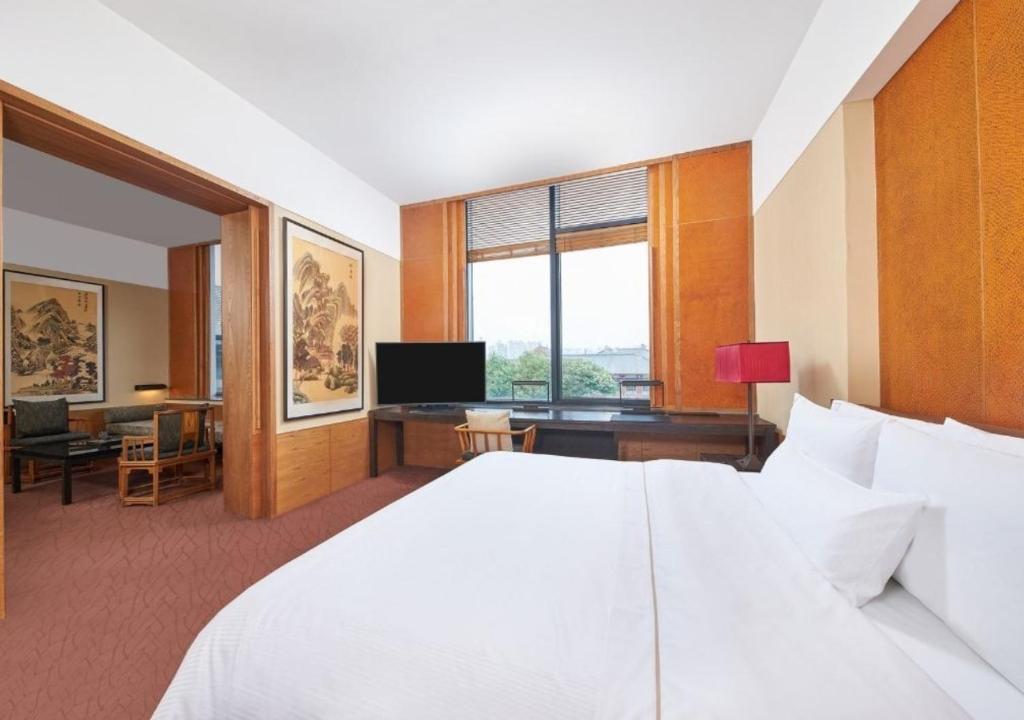 Postel nebo postele na pokoji v ubytování The Westin Xi'an