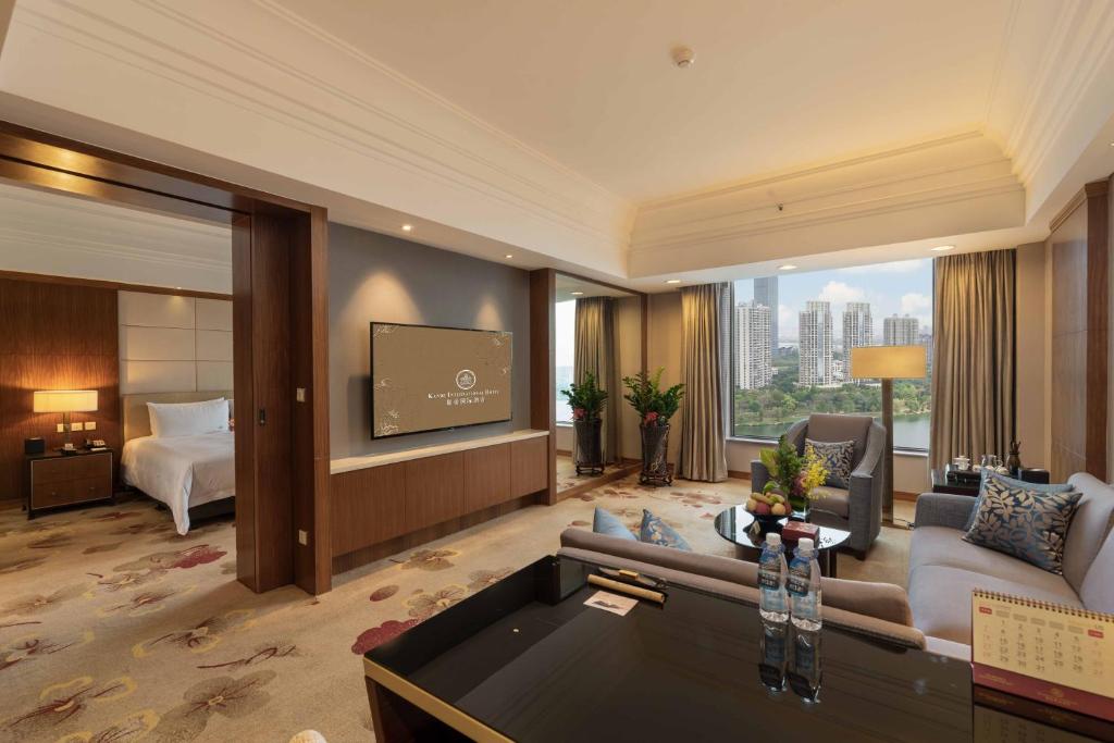 TV a/nebo společenská místnost v ubytování Huizhou Kande International Hotel