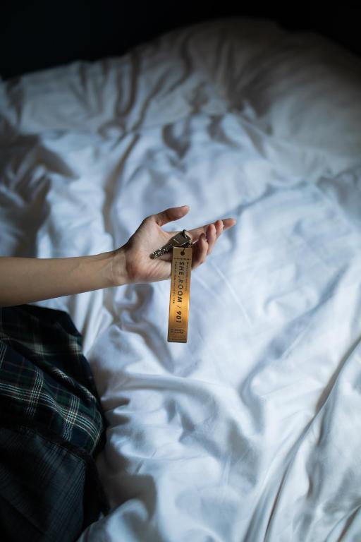 Postel nebo postele na pokoji v ubytování Hotel She, Osaka