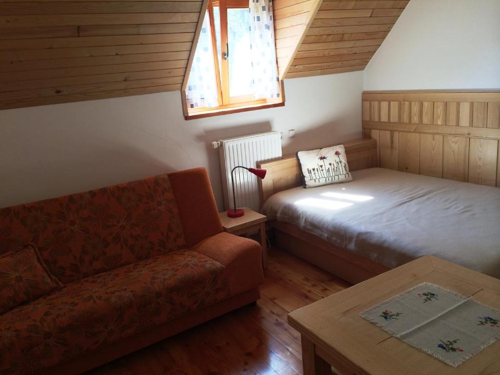 Postel nebo postele na pokoji v ubytování Govc-Vršnik