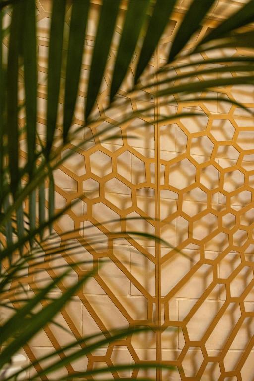 a close up of a yellow and white ceiling at Kempinski Hotel San Lawrenz in San Lawrenz